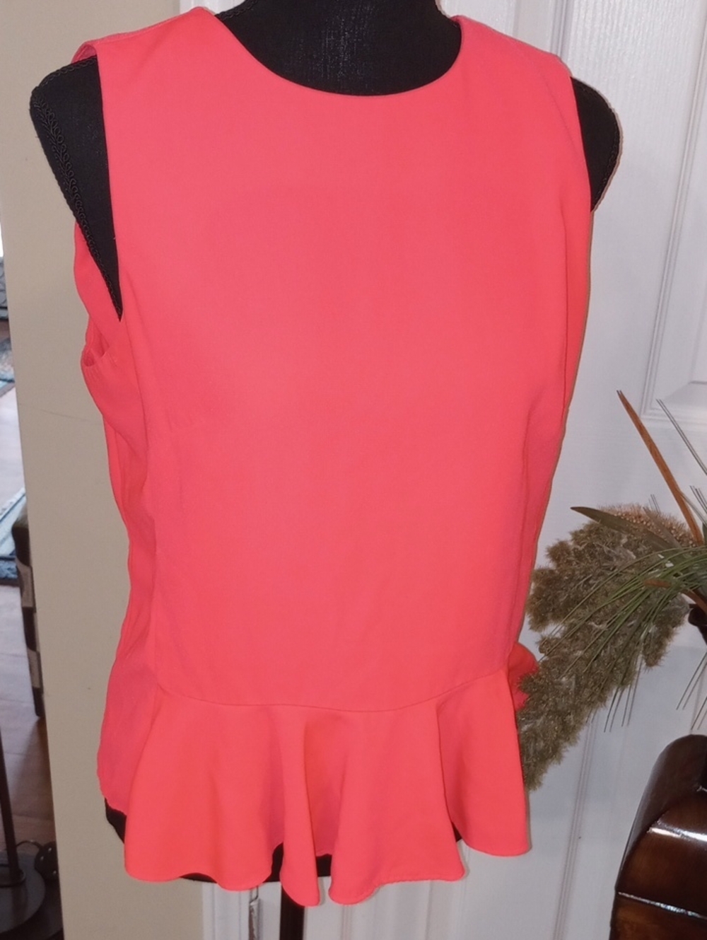 Classic Sleeveless Peplum Top in Coral Pink
